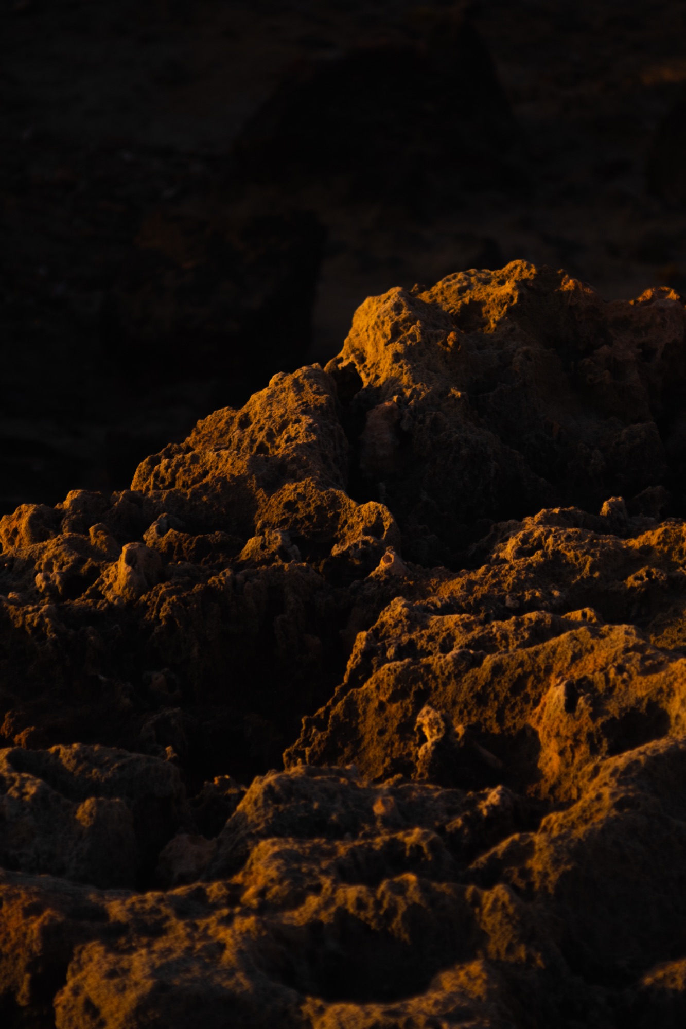 Limestone rocks on the Jávea coast catching the last light